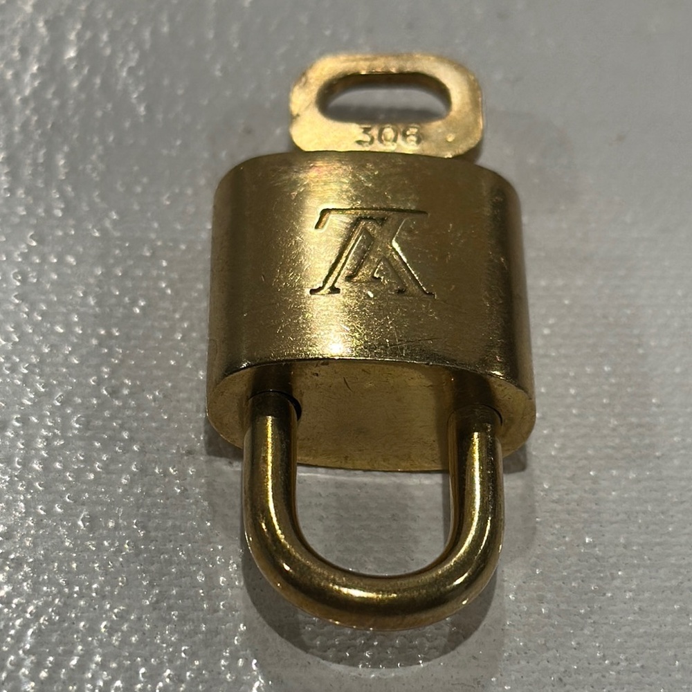 Louis Vuitton Authentic Vintage Lock and Key # 306.